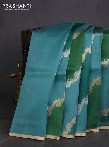 Banarasi organza silk saree teal green with rangakt weaves and zari woven piping boder