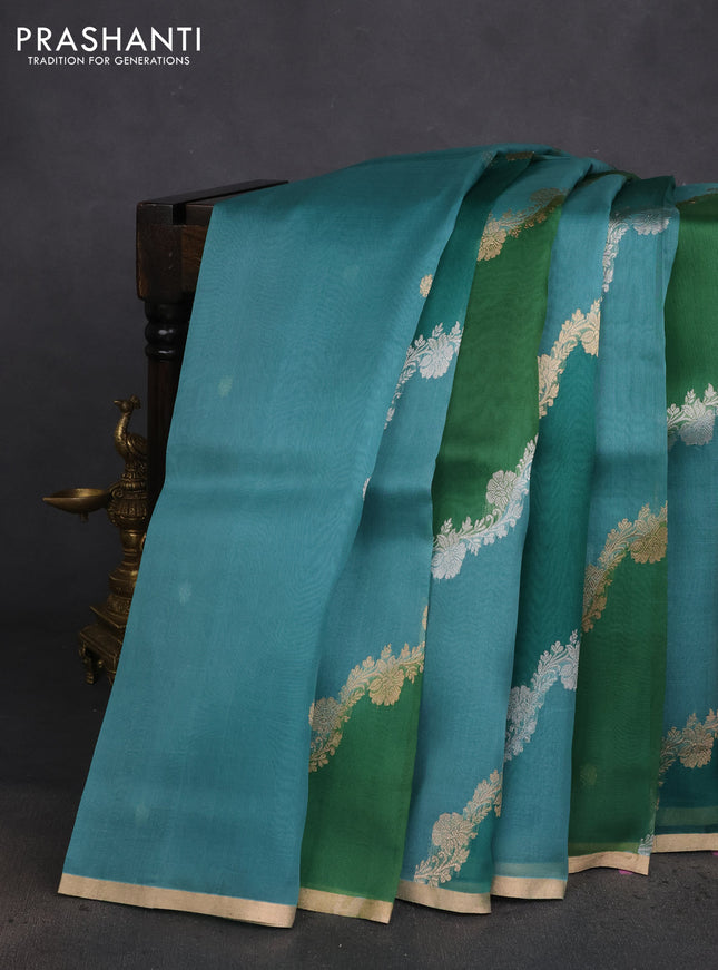 Banarasi organza silk saree teal green with rangakt weaves and zari woven piping boder
