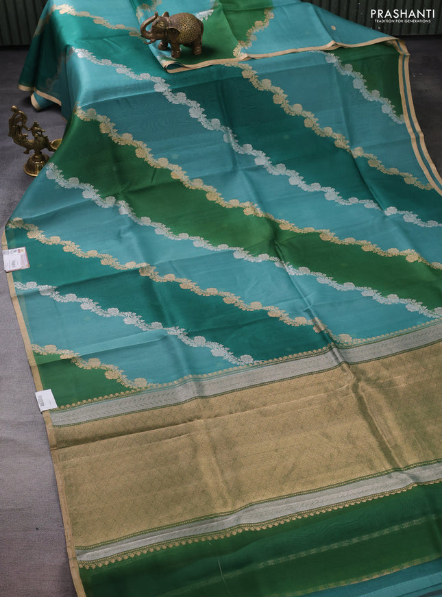 Banarasi organza silk saree teal green with rangakt weaves and zari woven piping boder