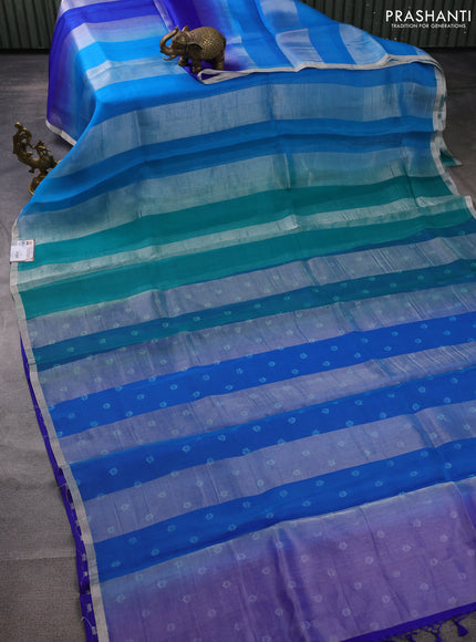 Pure organza silk saree teal blue and cs blue with allover silver zari stripes pattern and zari woven piping boder