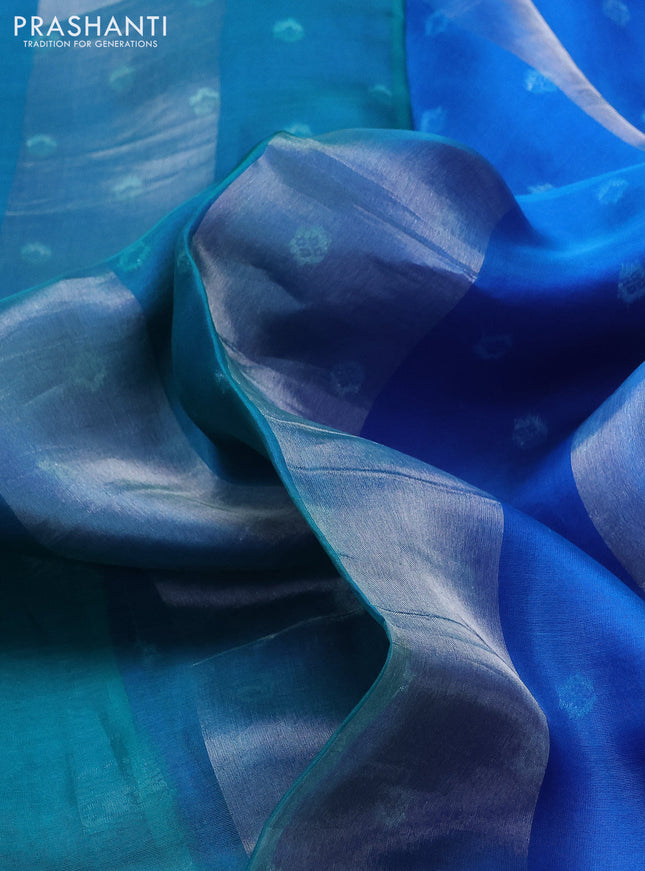 Pure organza silk saree teal blue and cs blue with allover silver zari stripes pattern and zari woven piping boder