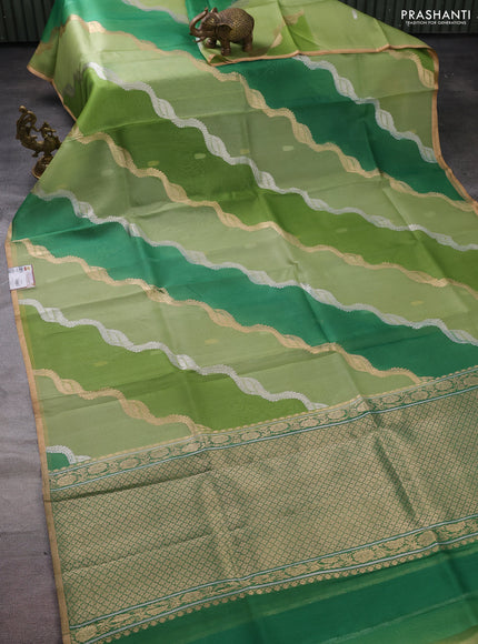 Banarasi organza silk saree green shade with allover silver & gold zari weaves and zari woven piping boder