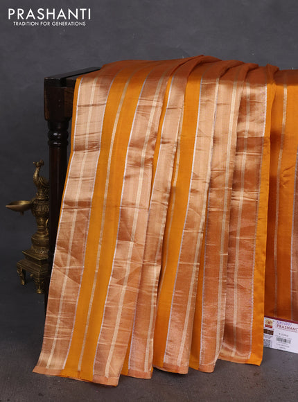 Pure organza silk saree mustard yellow with allover zari woven stripes pattern in borderless style