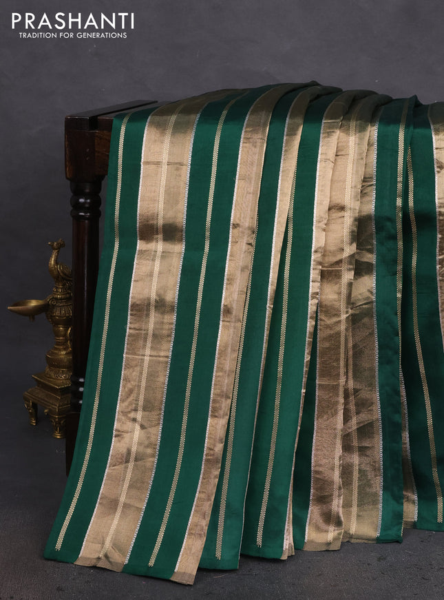 Pure organza silk saree green with allover zari woven stripes pattern in borderless style
