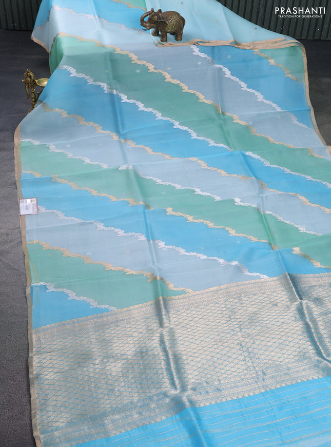 Banarasi organza silk saree pastel green and pastel blue with allover silver & gold zari weaves and zari woven piping boder