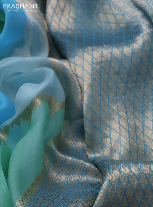 Banarasi organza silk saree pastel green and pastel blue with allover silver & gold zari weaves and zari woven piping boder