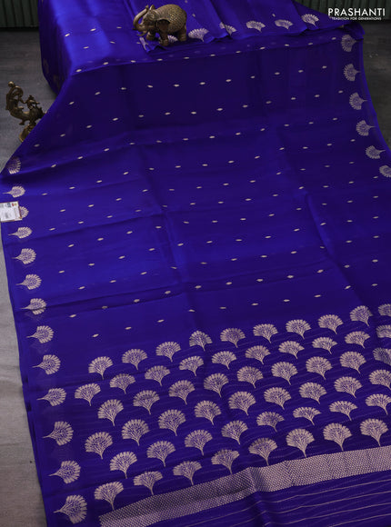 Banarasi organza silk saree blue with zari woven floral buttas and zari woven butta border