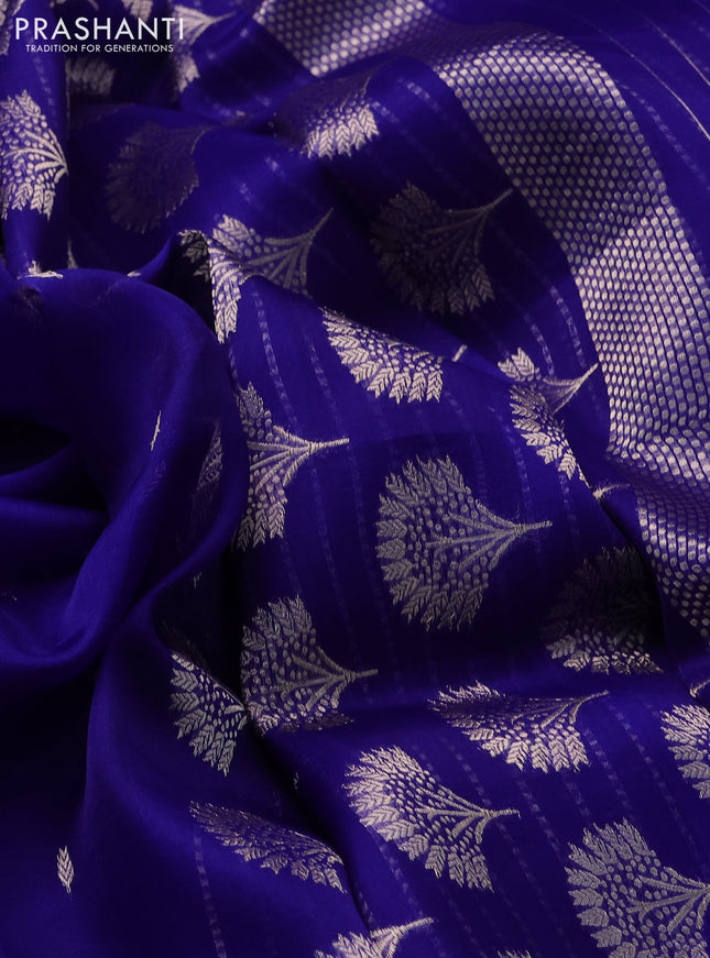 Banarasi organza silk saree blue with zari woven floral buttas and zari woven butta border
