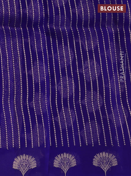 Banarasi organza silk saree blue with zari woven floral buttas and zari woven butta border