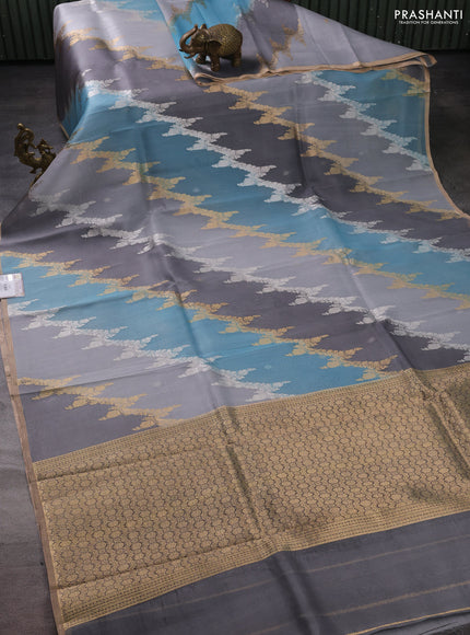 Banarasi organza silk saree grey and pastel blue with allover silver & gold zari weaves and zari woven piping boder