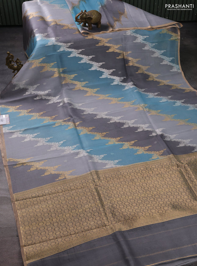 Banarasi organza silk saree grey and pastel blue with allover silver & gold zari weaves and zari woven piping boder