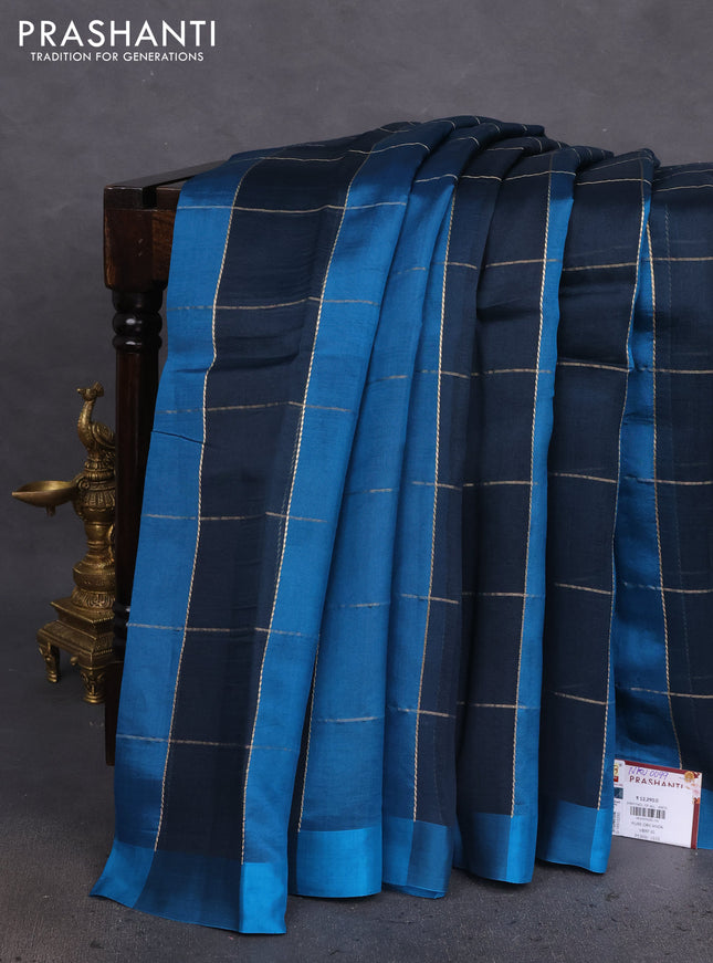 Pure organza silk saree peacock blue and cs blue with allover zari checks and simple border