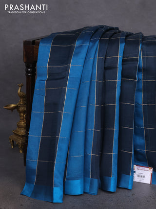 Pure organza silk saree peacock blue and cs blue with allover zari checks and simple border