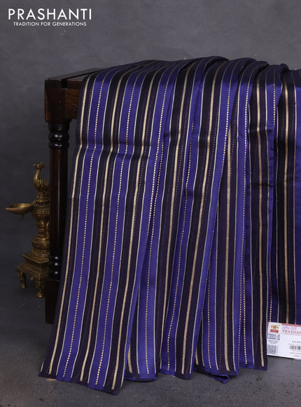 Pure organza silk saree navy blue and blue with allover zari woven stripes pattern in borderless style