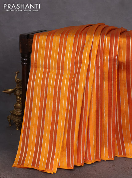Pure organza silk saree dark mustard with allover zari woven stripes pattern in borderless style