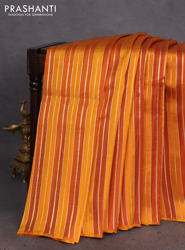 Pure organza silk saree dark mustard with allover zari woven stripes pattern in borderless style