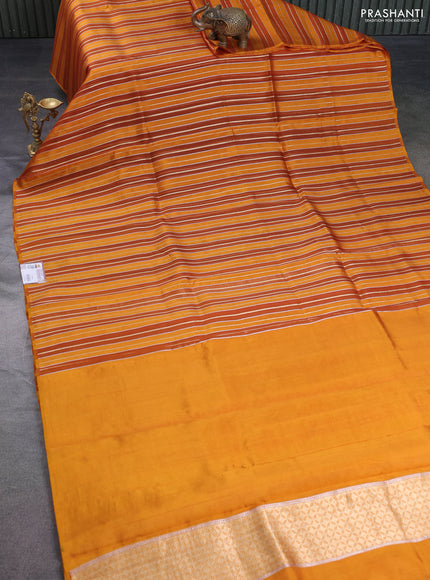 Pure organza silk saree dark mustard with allover zari woven stripes pattern in borderless style