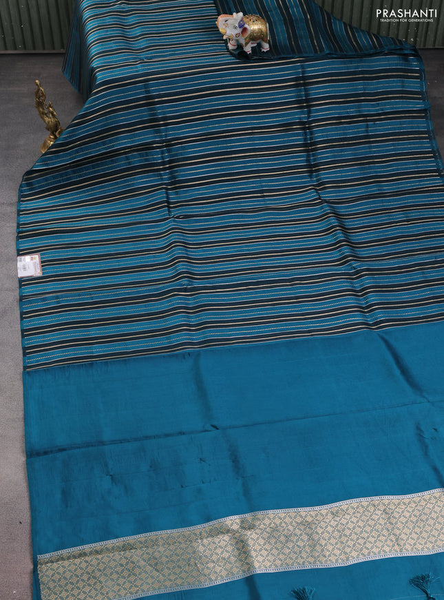 Pure organza silk saree dark peacock blue and peacock blue with allover silver & gold zari woven stripe pattern in borderless style