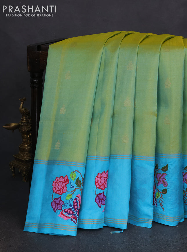 Pure soft silk saree dual shade of teal bluish yellow and teal blue with zari woven floral buttas and zari woven embroidery butta border