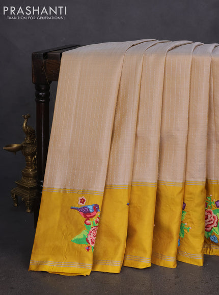 Pure soft silk saree beige and yellow with allover silver zari weaves and silver zari woven embroidery butta border