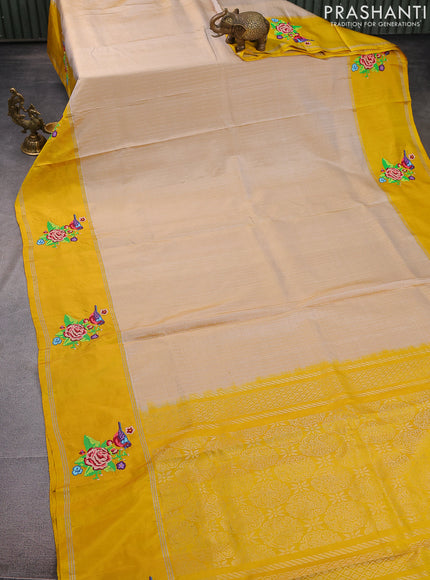 Pure soft silk saree beige and yellow with allover silver zari weaves and silver zari woven embroidery butta border