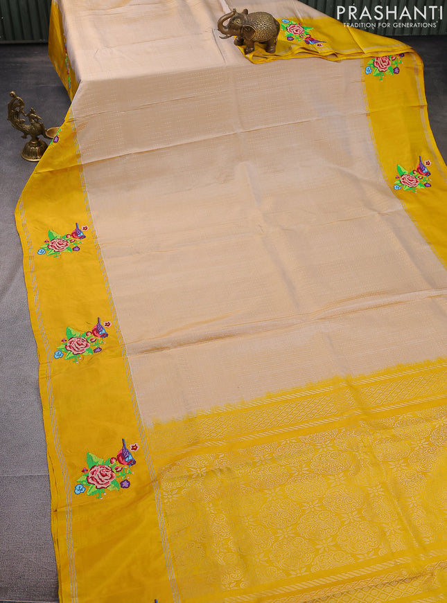 Pure soft silk saree beige and yellow with allover silver zari weaves and silver zari woven embroidery butta border