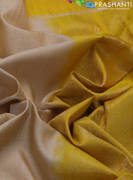 Pure soft silk saree beige and yellow with allover silver zari weaves and silver zari woven embroidery butta border