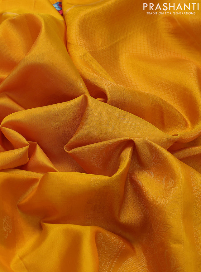 Pure soft silk saree mango yellow with zari woven floral buttas and zari woven embroidery butta border