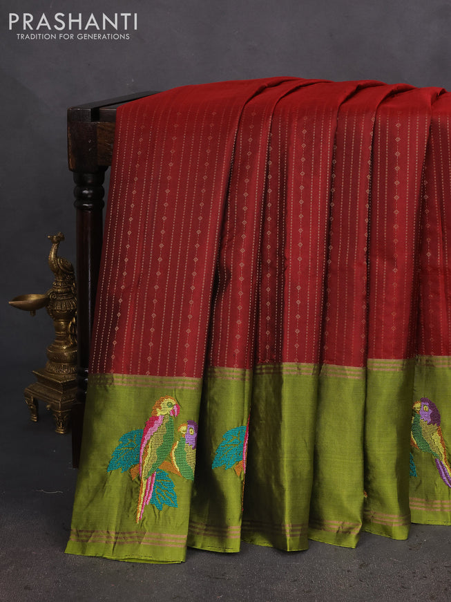 Pure soft silk saree maroon and green with allover zari weaves and zari woven parrot embroidery butta border