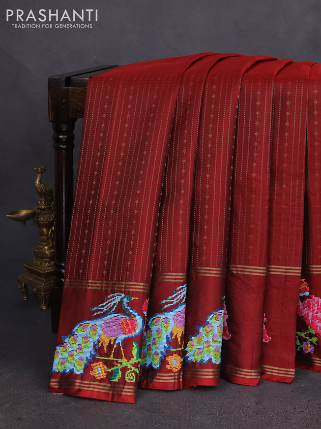 Pure soft silk saree maroon with allover zari weaves and zari woven parrot embroidery butta border