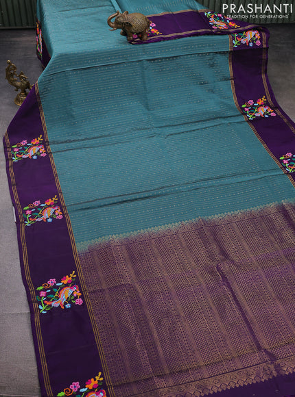 Pure soft silk saree pastel blue shade and purple with allover zari weaves and zari woven embroidery butta border