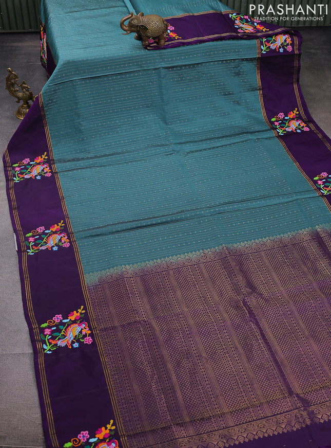 Pure soft silk saree pastel blue shade and purple with allover zari weaves and zari woven embroidery butta border