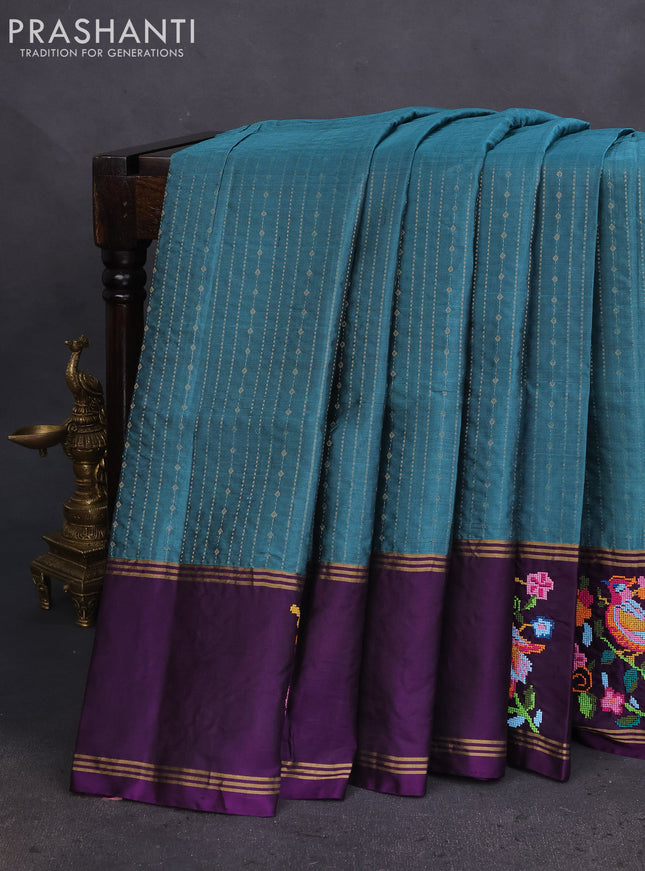 Pure soft silk saree peacock green shade and purple with allover zari weaves and zari woven embroidery butta border
