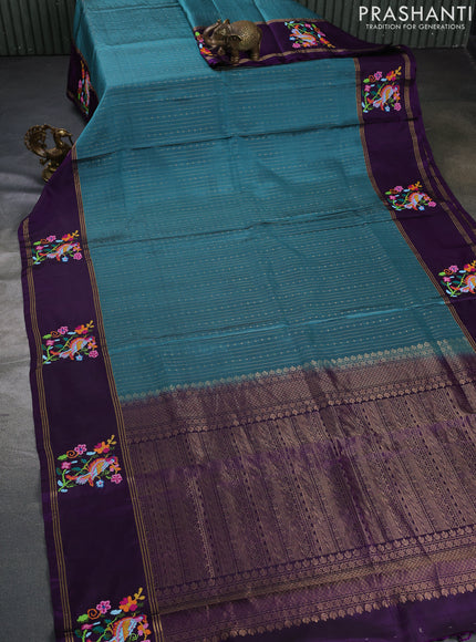 Pure soft silk saree peacock green shade and purple with allover zari weaves and zari woven embroidery butta border