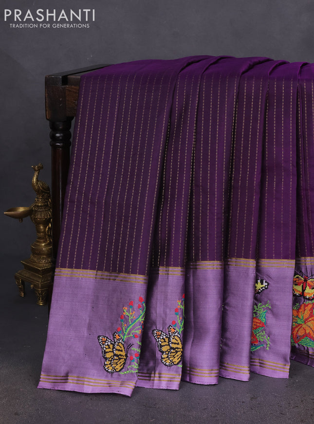 Pure soft silk saree purple and mild purple with allover zari weaves and zari woven embroidery butta border