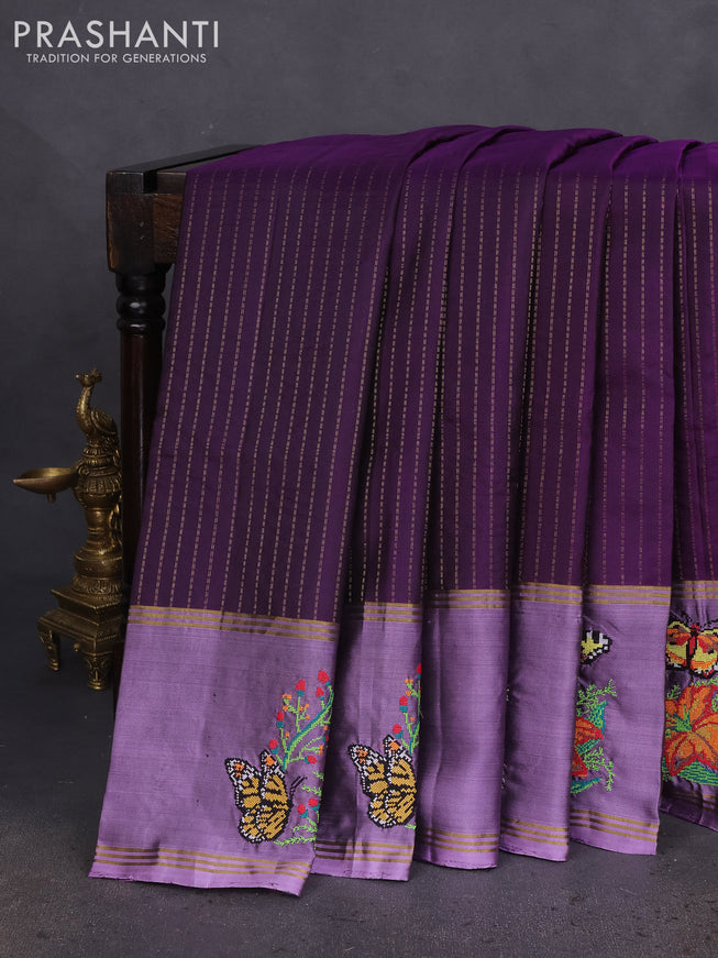 Pure soft silk saree purple and mild purple with allover zari weaves and zari woven embroidery butta border