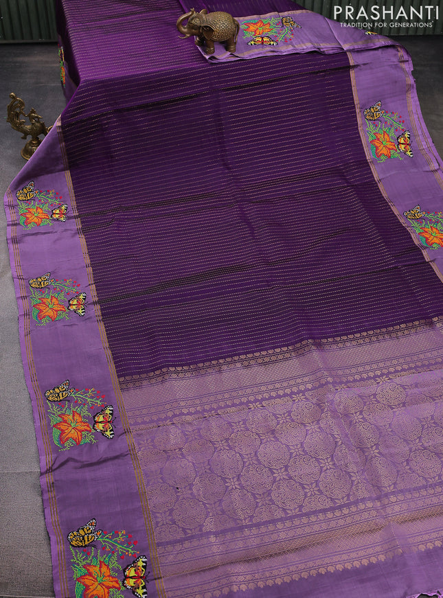 Pure soft silk saree purple and mild purple with allover zari weaves and zari woven embroidery butta border