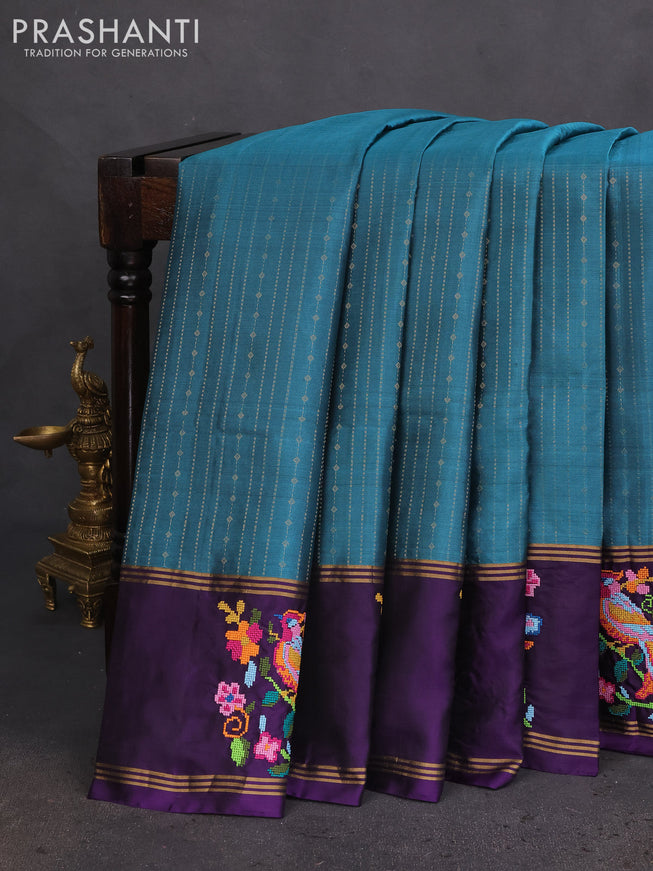 Pure soft silk saree teal blue shade and violet with allover zari weaves and zari woven embroidery butta border