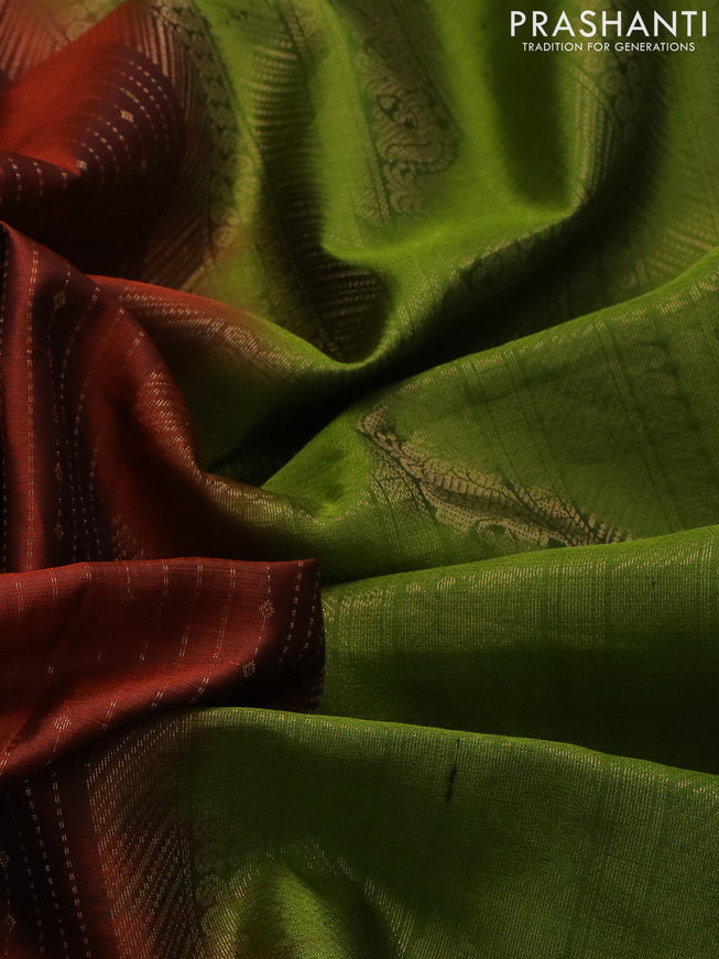 Pure soft silk saree rust shade and mehendi green with allover zari weaves and zari woven embroidery butta border