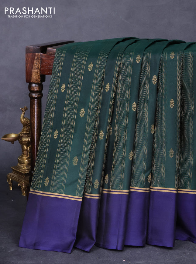 Kanchipuram silk saree bottle green and dark blue with allover zari weaves & buttas and zari woven simple border