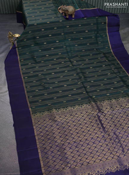 Kanchipuram silk saree bottle green and dark blue with allover zari weaves & buttas and zari woven simple border