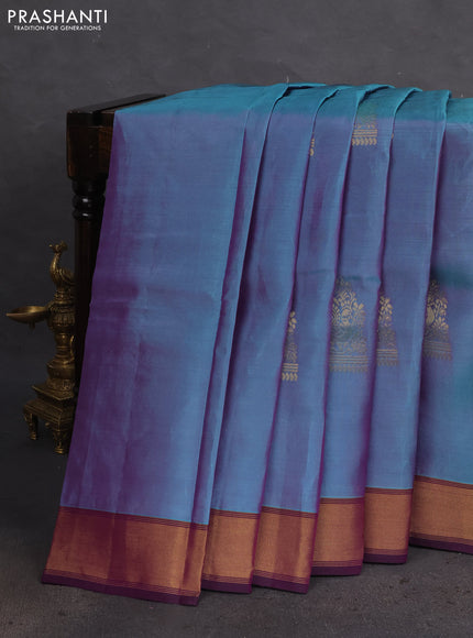 Kanchipuram silk saree dual shade of teal and deep purple with annam zari woven buttas and zari woven border