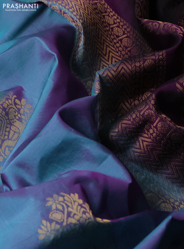Kanchipuram silk saree dual shade of teal and deep purple with annam zari woven buttas and zari woven border