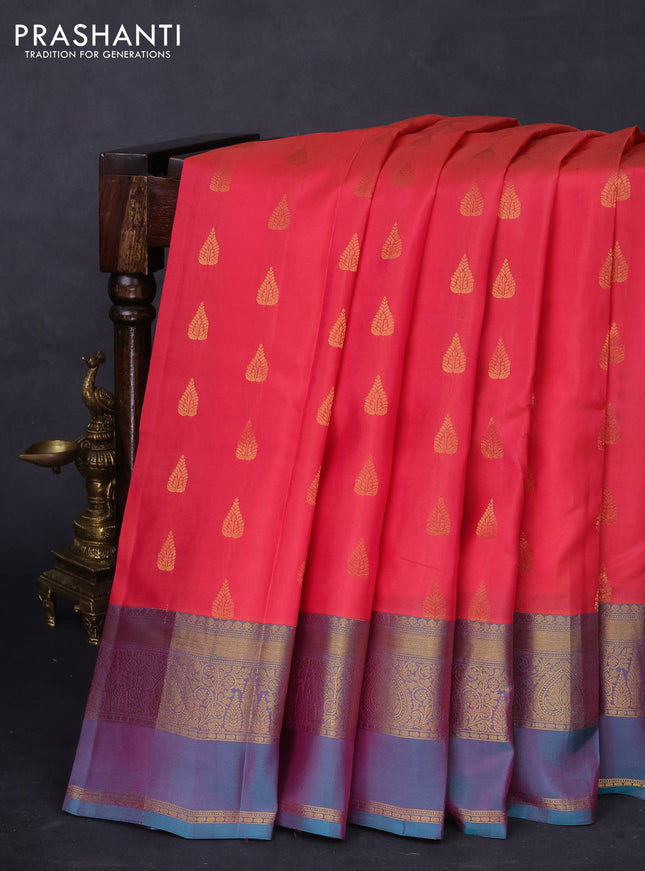 Kanchipuram silk saree peach pink and dual shade of teal green with zari woven buttas and zari woven border