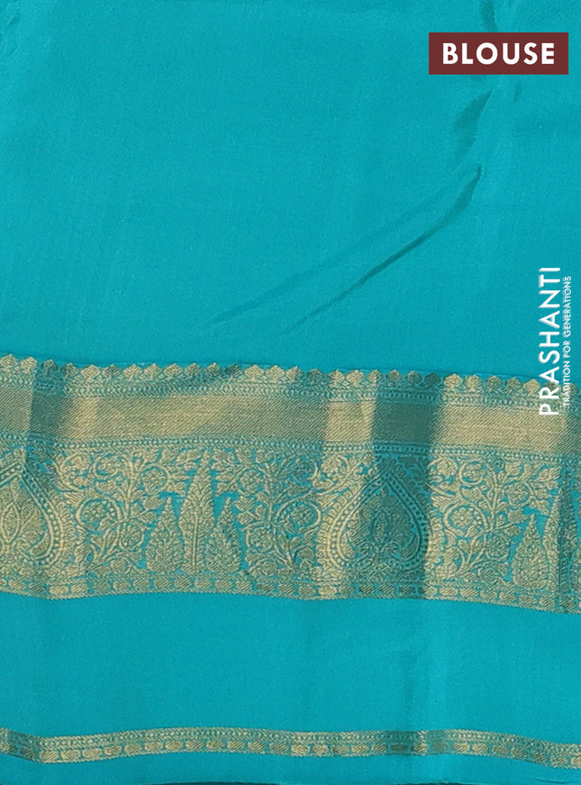 Kanchipuram silk saree peach pink and dual shade of teal green with zari woven buttas and zari woven border
