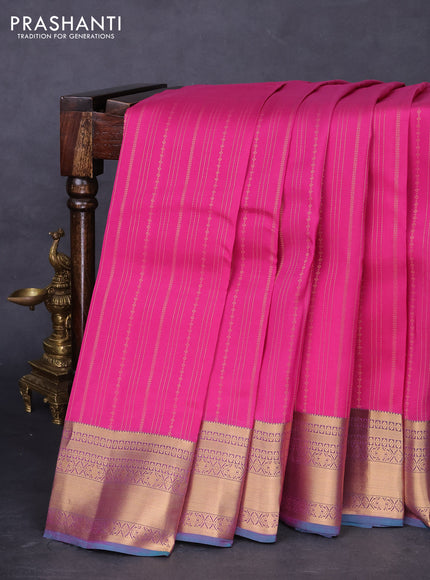 Kanchipuram silk saree pink and dual shade of teal green with allover zari weaves and zari woven border
