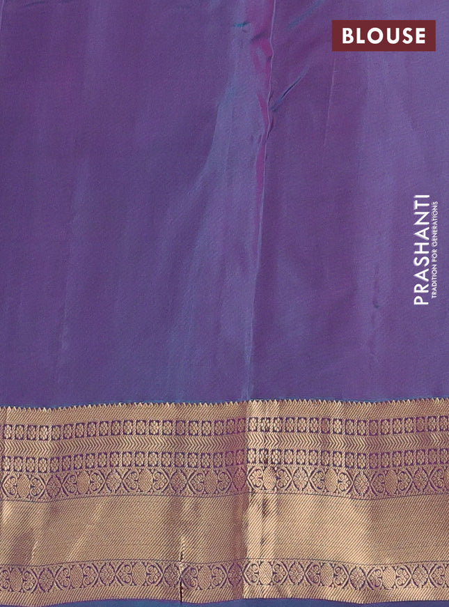 Kanchipuram silk saree pink and dual shade of teal green with allover zari weaves and zari woven border