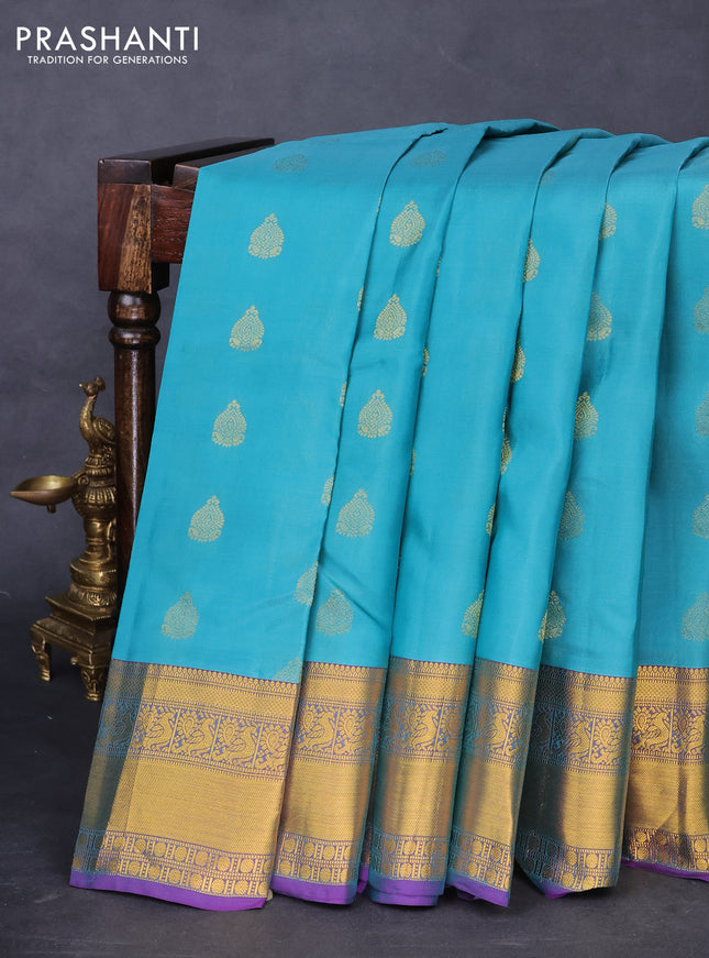 Kanchipuram silk saree teal green and purple with zari woven buttas and zari woven border