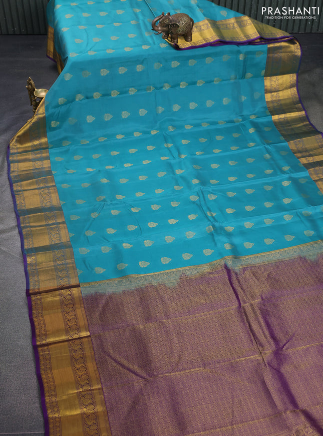 Kanchipuram silk saree teal green and purple with zari woven buttas and zari woven border
