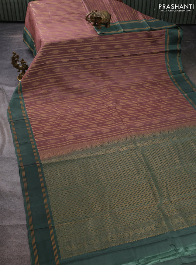Kanchipuram silk saree peach shade and pastel green with allover zari weaves and rettapet zari woven border